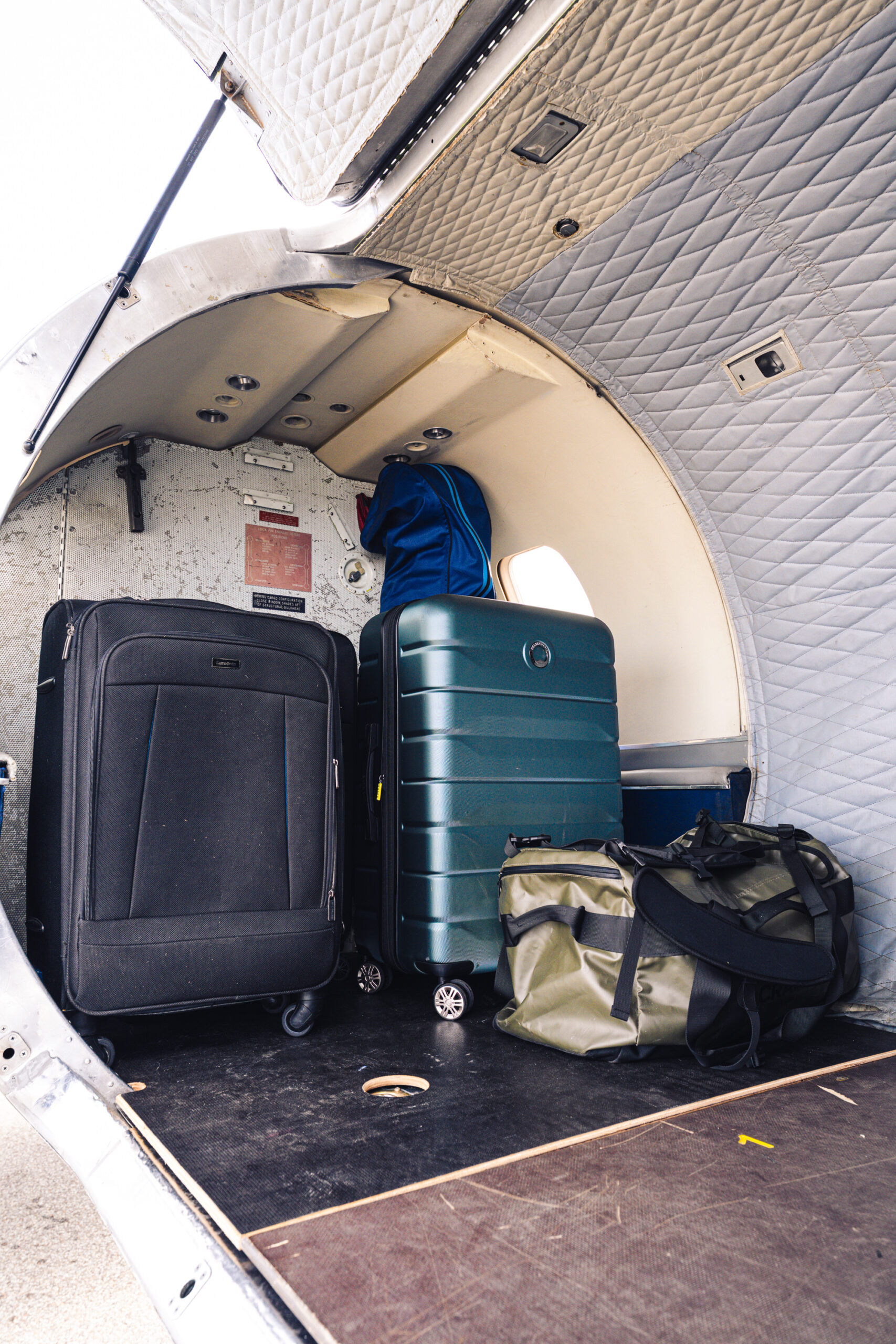 Loading suitcases into the rear hold